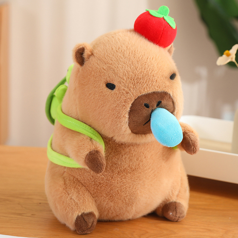 Soft Capybara Plush with Backpack with Orange on Head